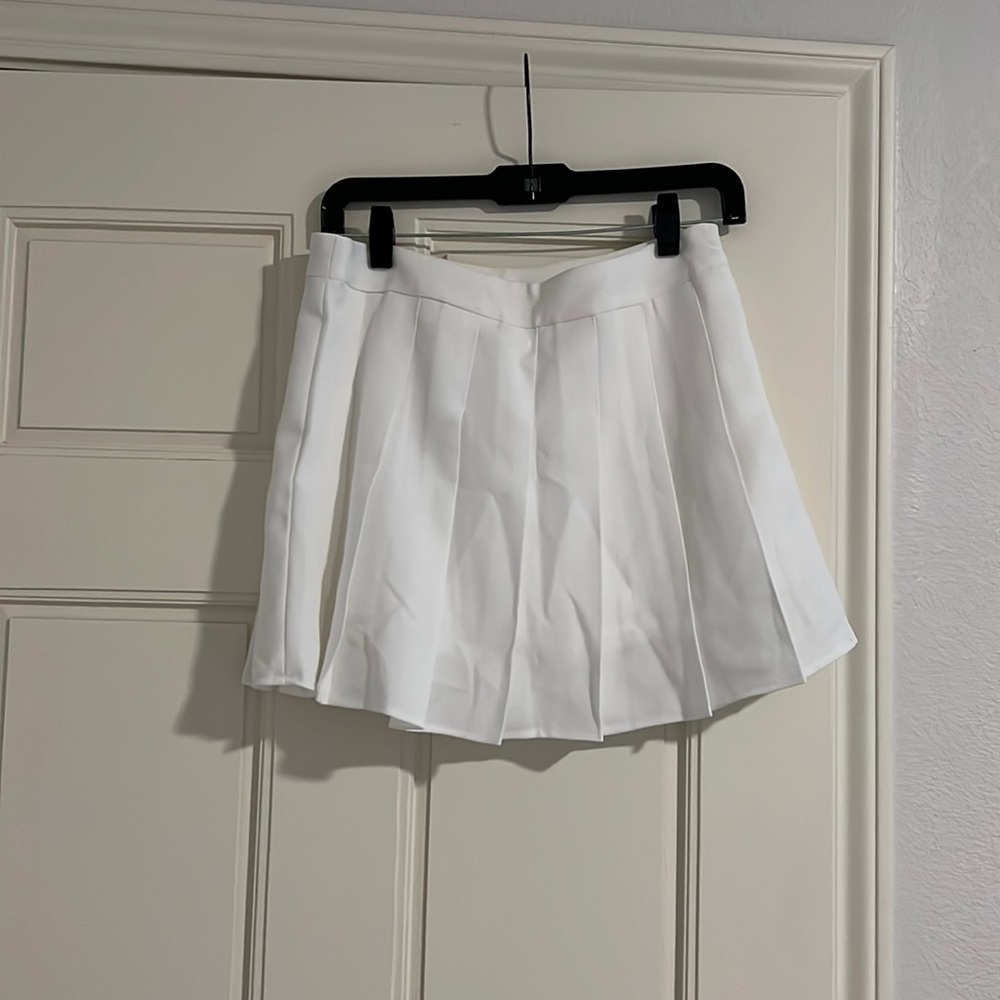 White pleated tennis skirt